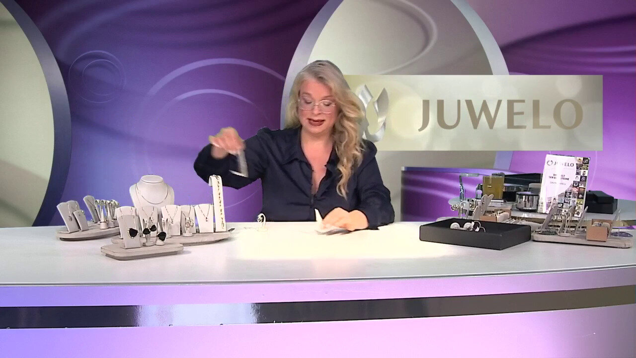 Video Zilveren oorbellen met robijnen