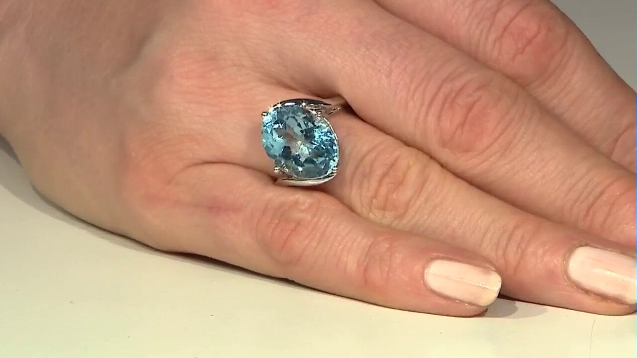 Video Zilveren ring met een hemel-blauwe topaas