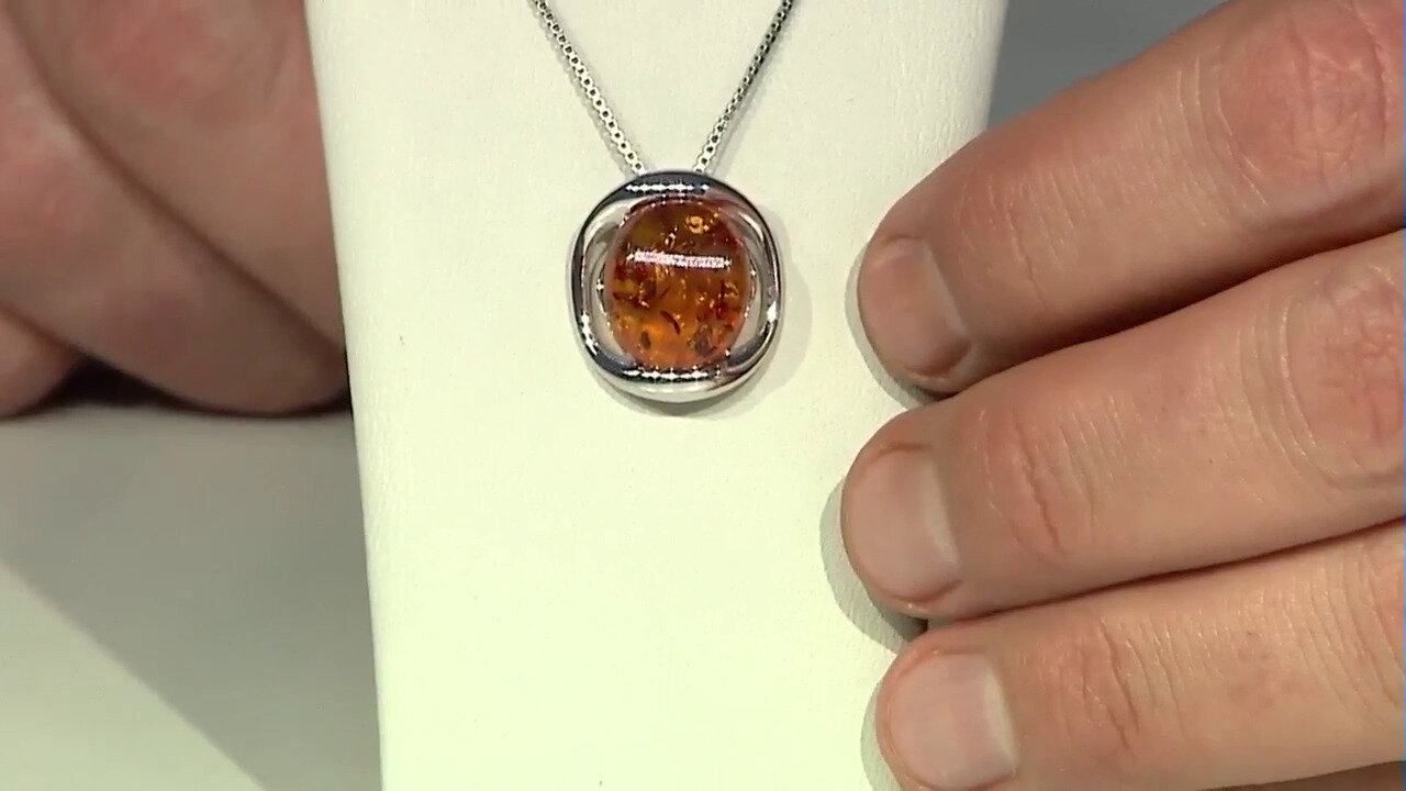 Video Pendentif en argent et Ambre baltique couleur cognac (dagen)