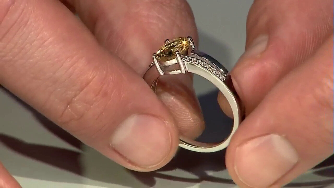 Video Zilveren ring met een gele beril