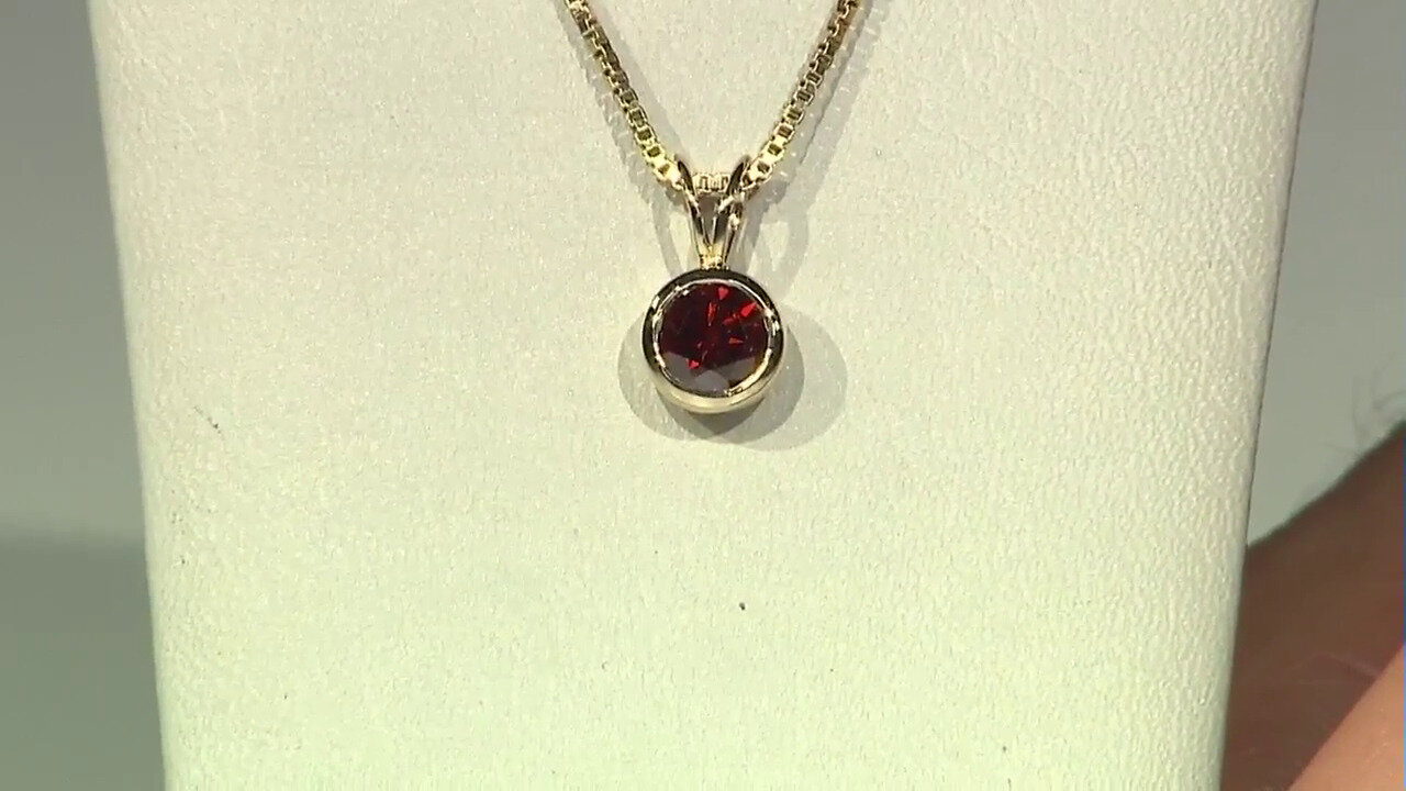 Video Pendentif en or et Diamant rouge I2