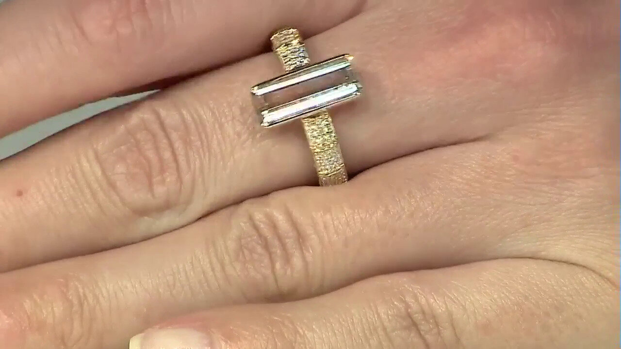 Video Gouden ring met een Meerkleurige Oekraïense Topaas (de Melo)