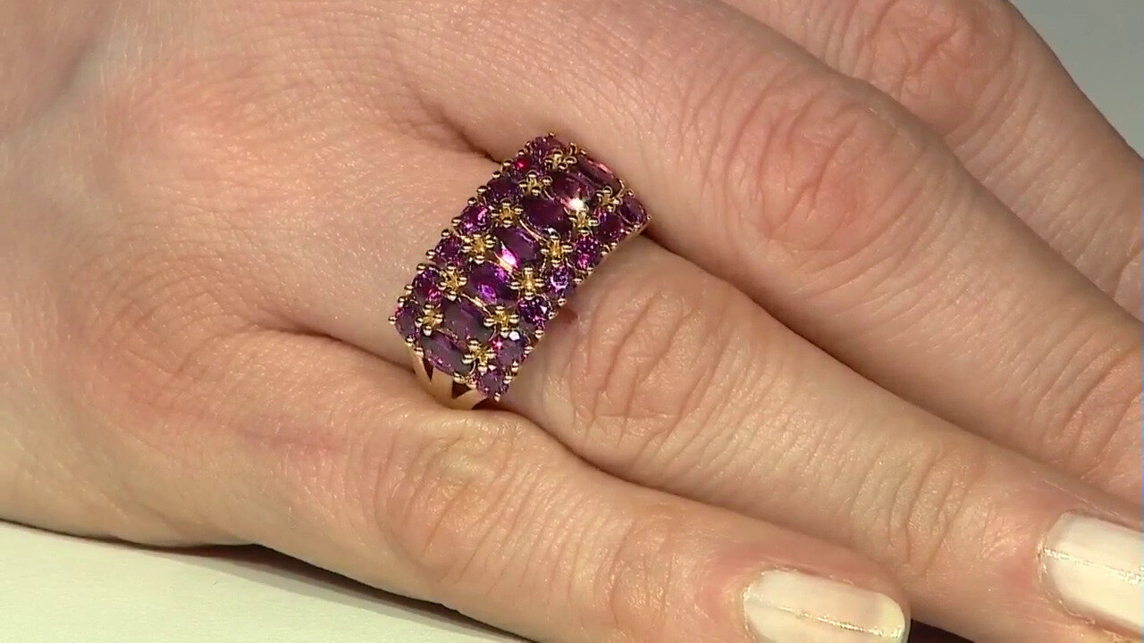 Video Zilveren ring met magenta granaten