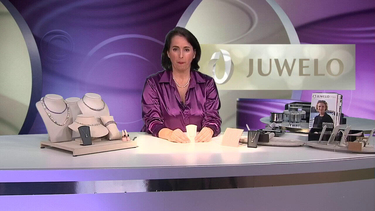 Video Zilveren halsketting met een witte topaas