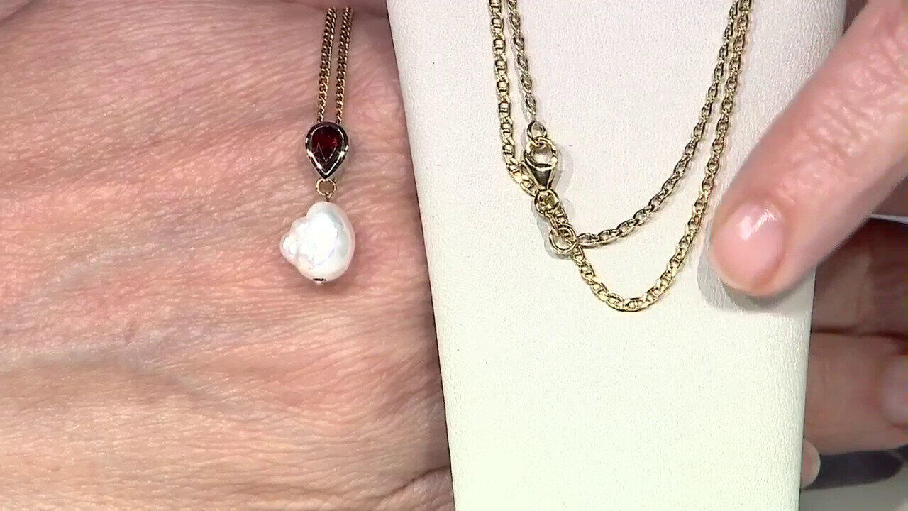 Video Pendentif en argent et Perle blanche de culture d'eau douce