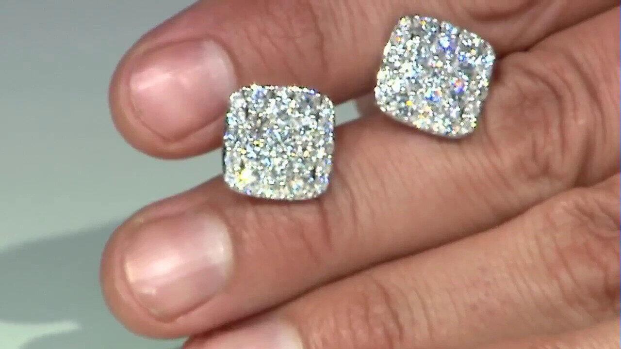 Video Gouden oorbellen met I1 (H) Diamanten (CIRARI)