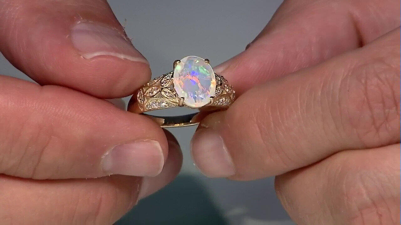 Video Gouden ring met een AAA Welo-opaal (de Melo)