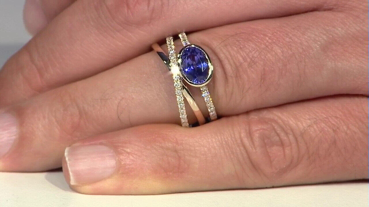 Video Gouden ring met een AAA tanzaniet (CIRARI)