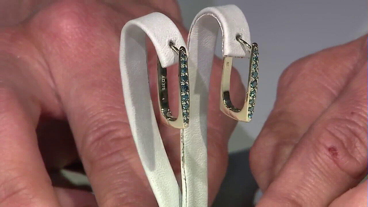 Video Orecchini in oro con Diamante Blu VS1