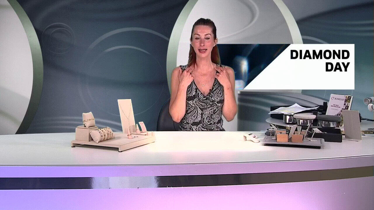 Video Collana in oro con Diamante blu cielo VS1