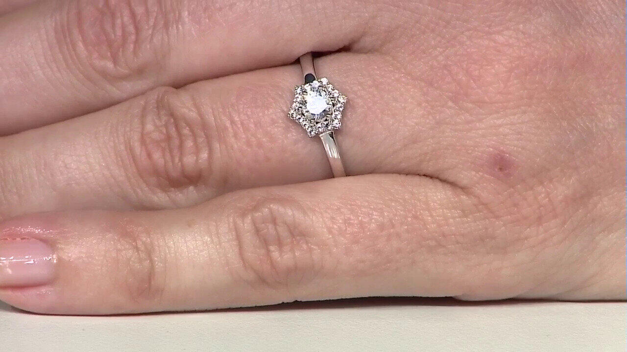 Video Zilveren ring met een witte saffier