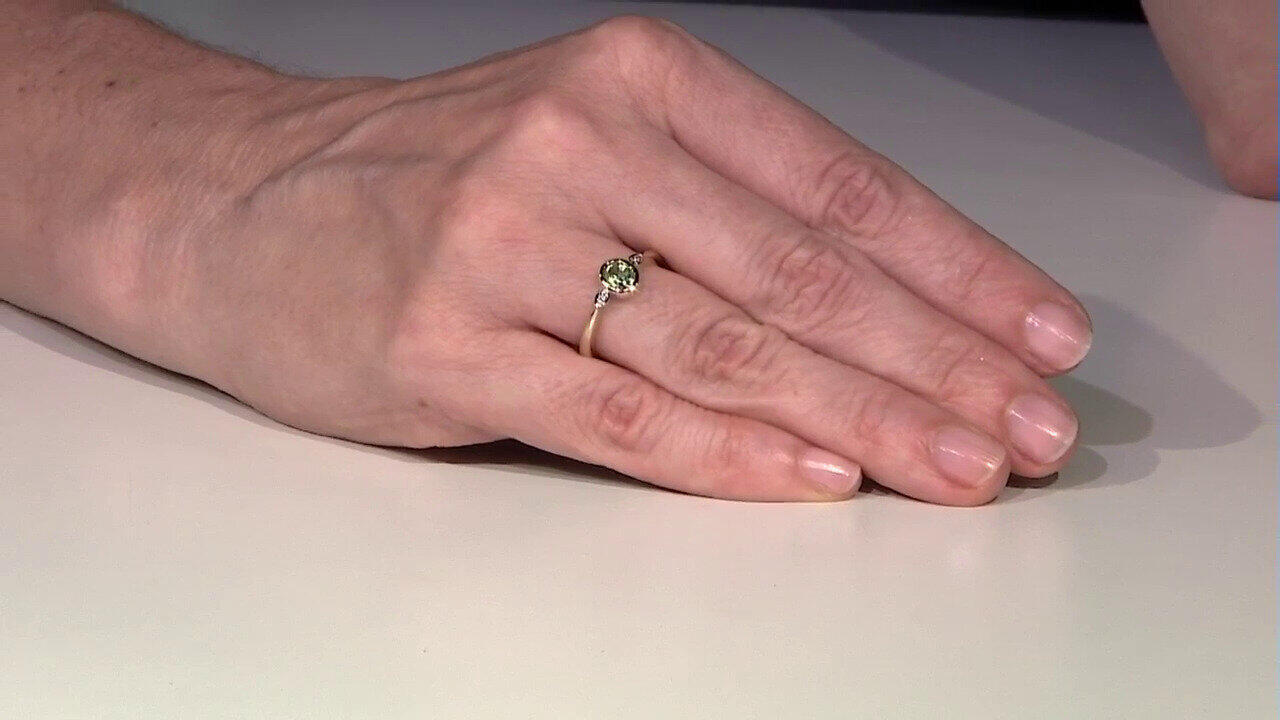 Video Gouden ring met een Munt Kyaniet (CUSTODANA)