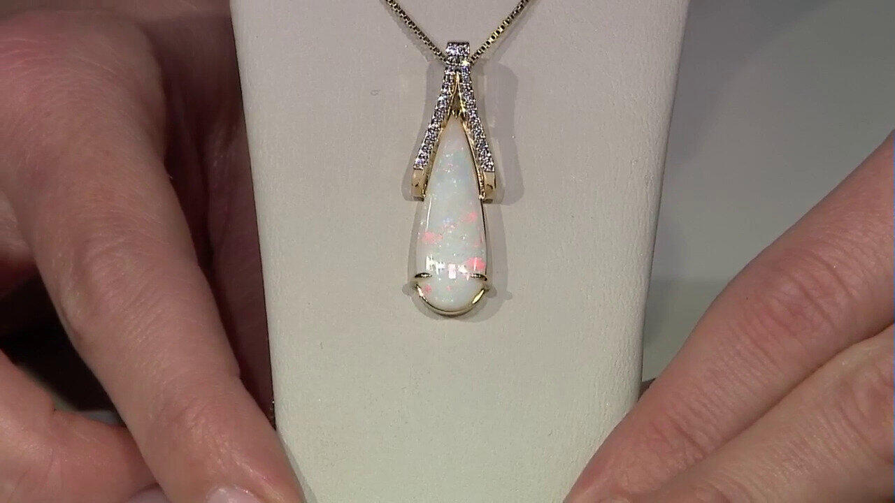 Video Pendentif en or et Opale blanche du Brésil