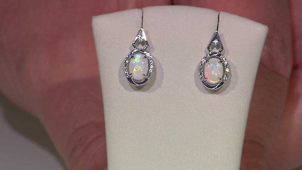 Video Boucles d'oreilles en or et Opale blanche du Brésil