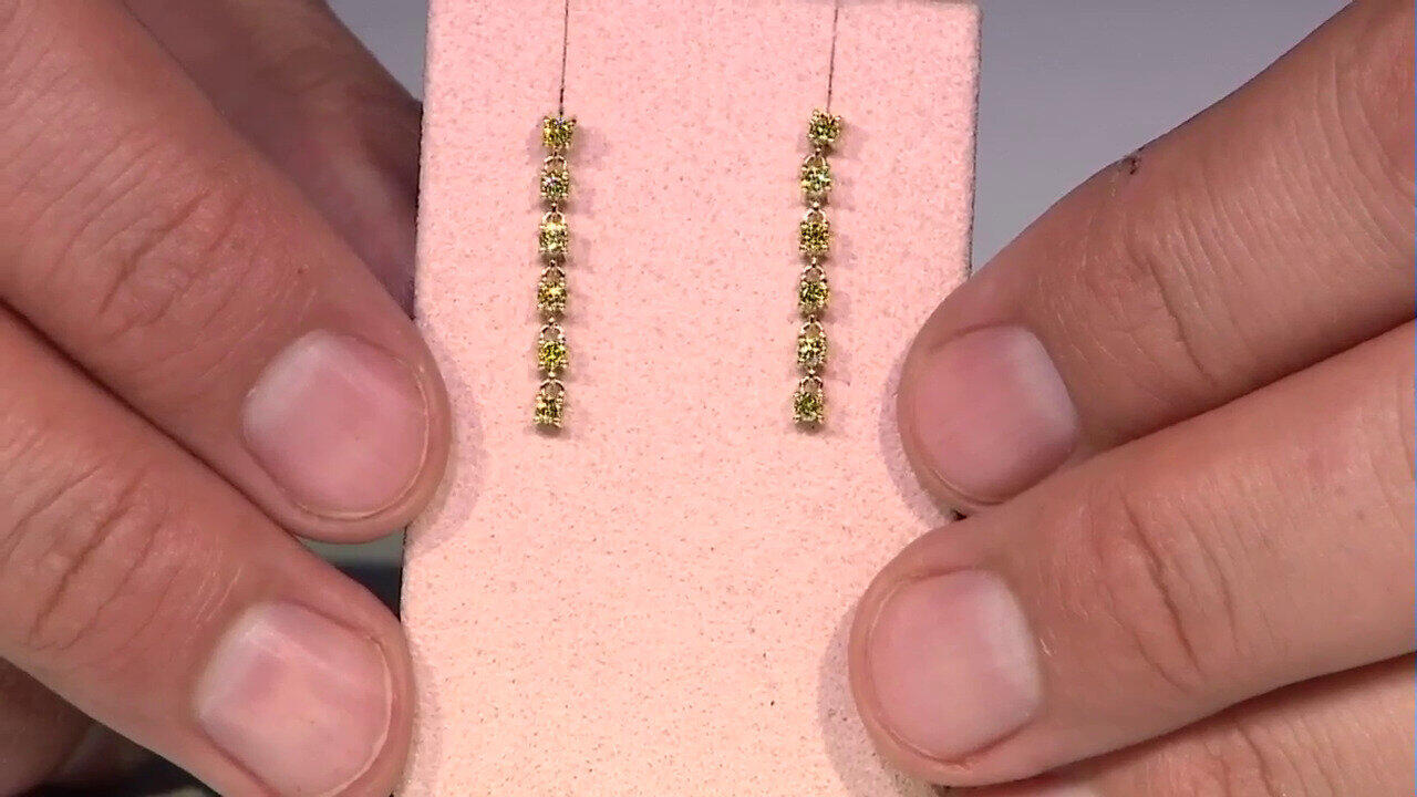 Video Orecchini in oro con Diamante Giallo SI2