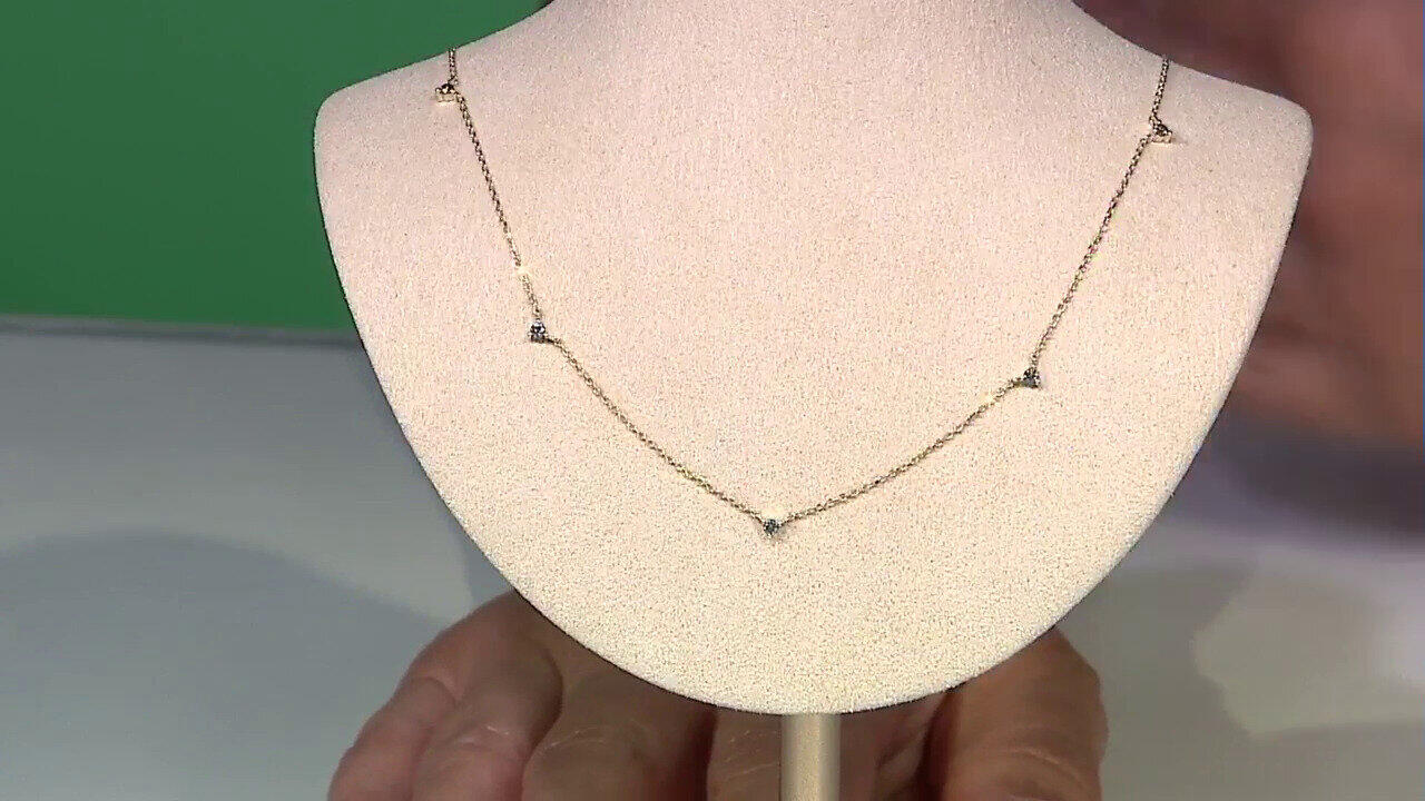 Video Collier en or et Diamant bleu ciel I2 (de Melo)