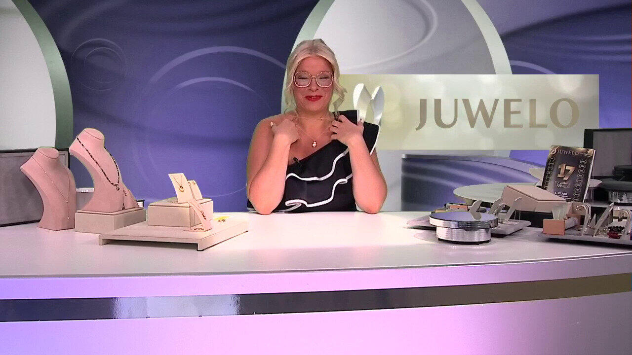 Video Zilveren halsketting met een witte topaas