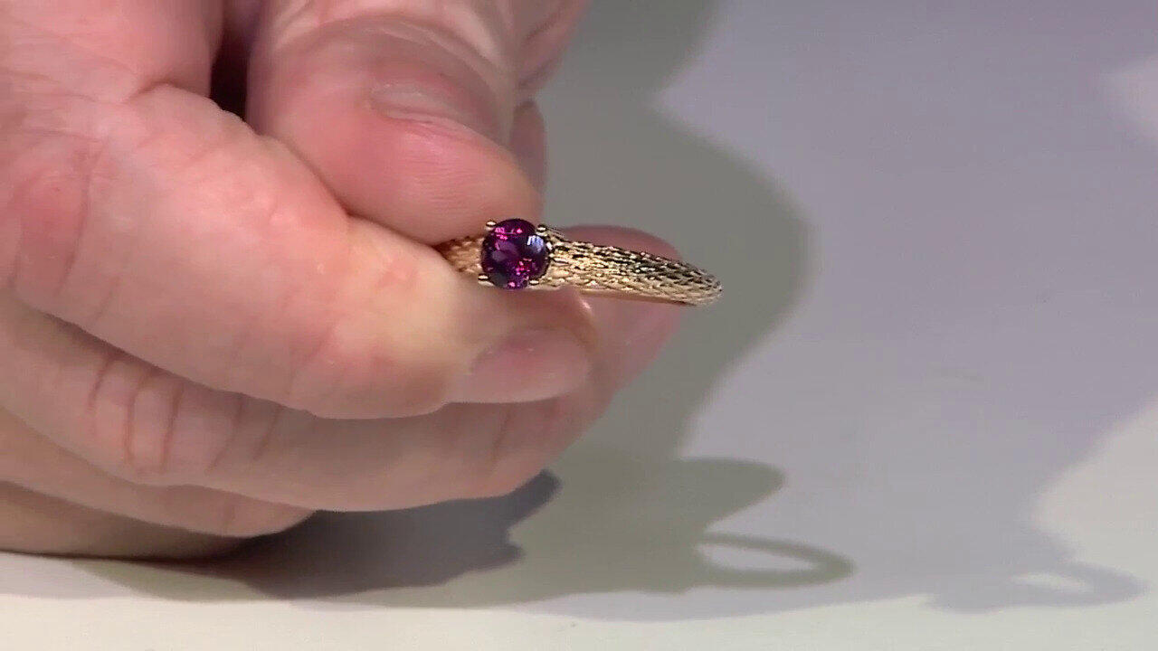 Video Gouden ring met een magenta granaat (de Melo)