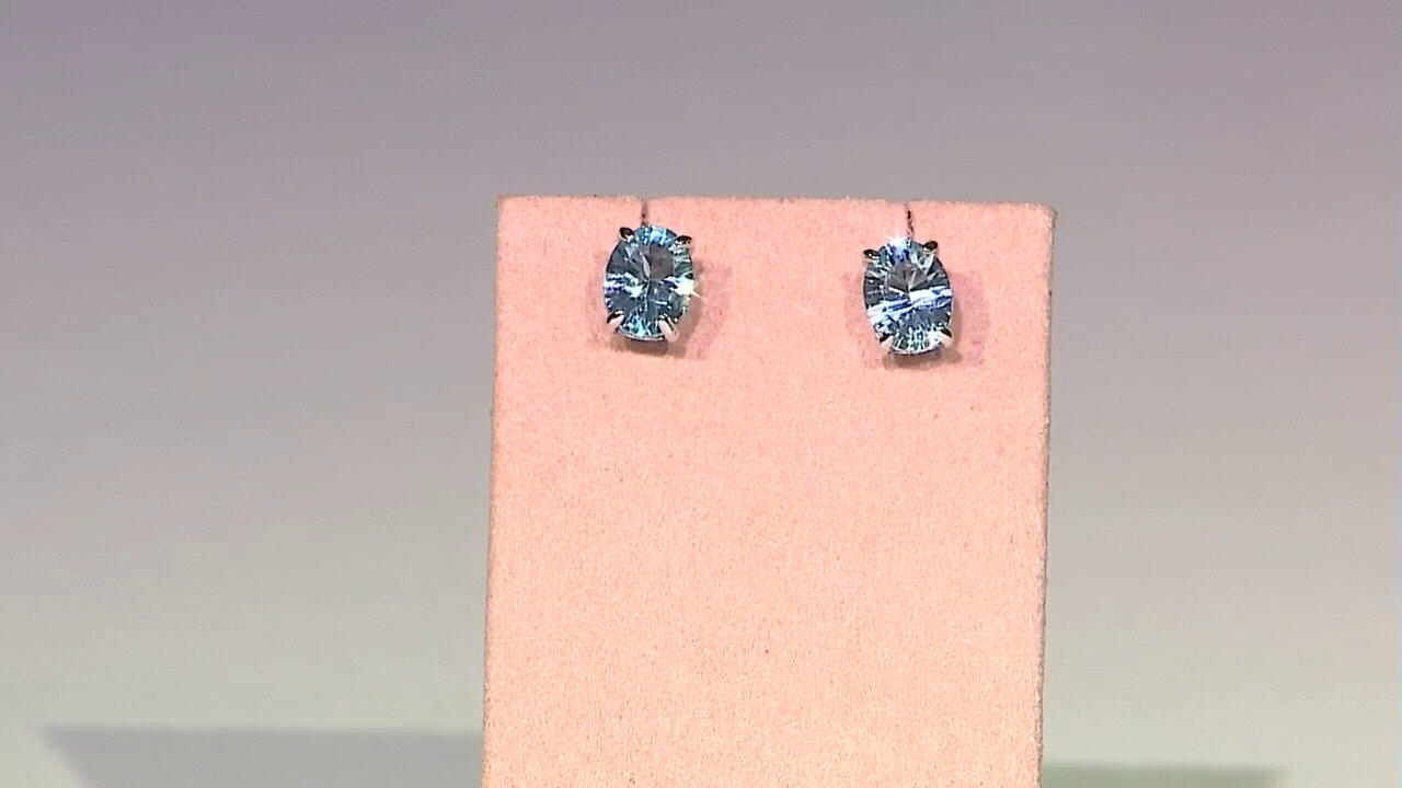 Video Zilveren oorbellen met hemel-blauwe topaasstenen