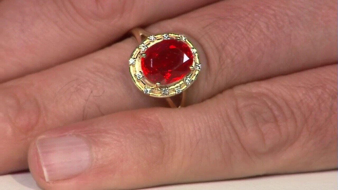 Video Gouden ring met een AAA Mexicaanse vuur opaal