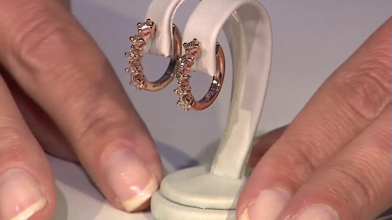 Video Gouden oorbellen met I2 Bruine Diamanten