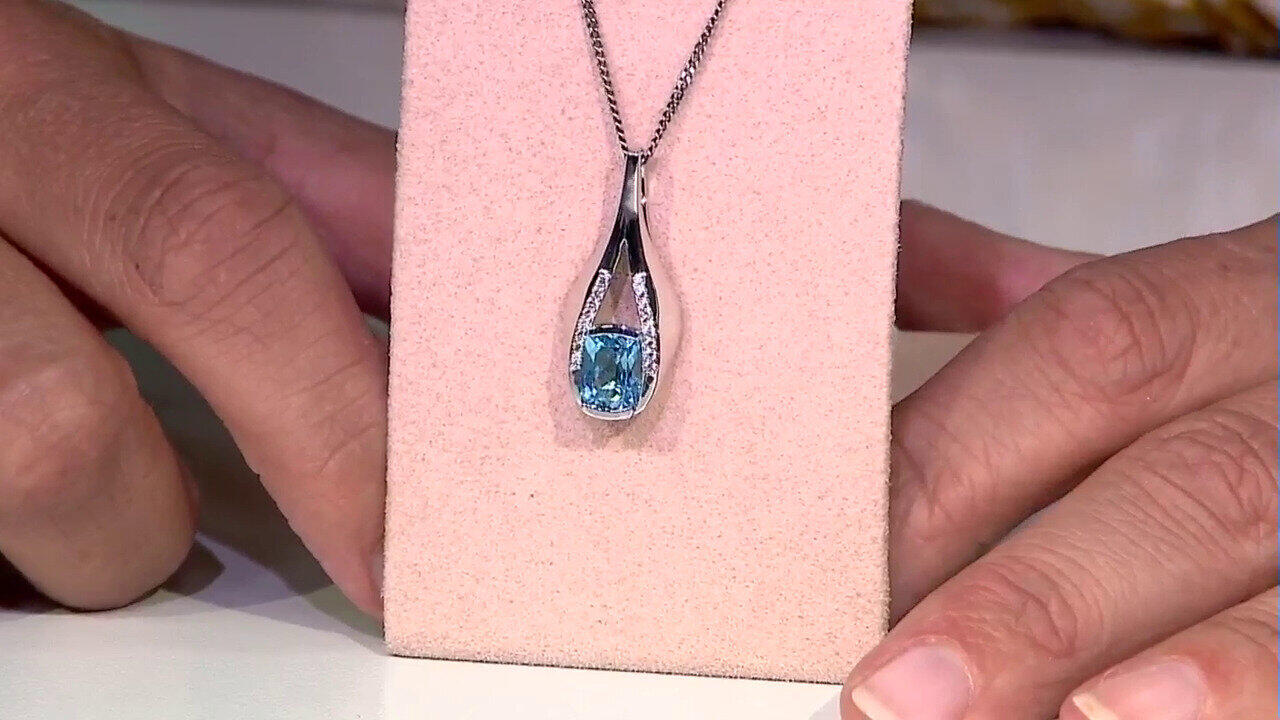 Video Colgante en plata con Topacio azul suizo (de Melo)