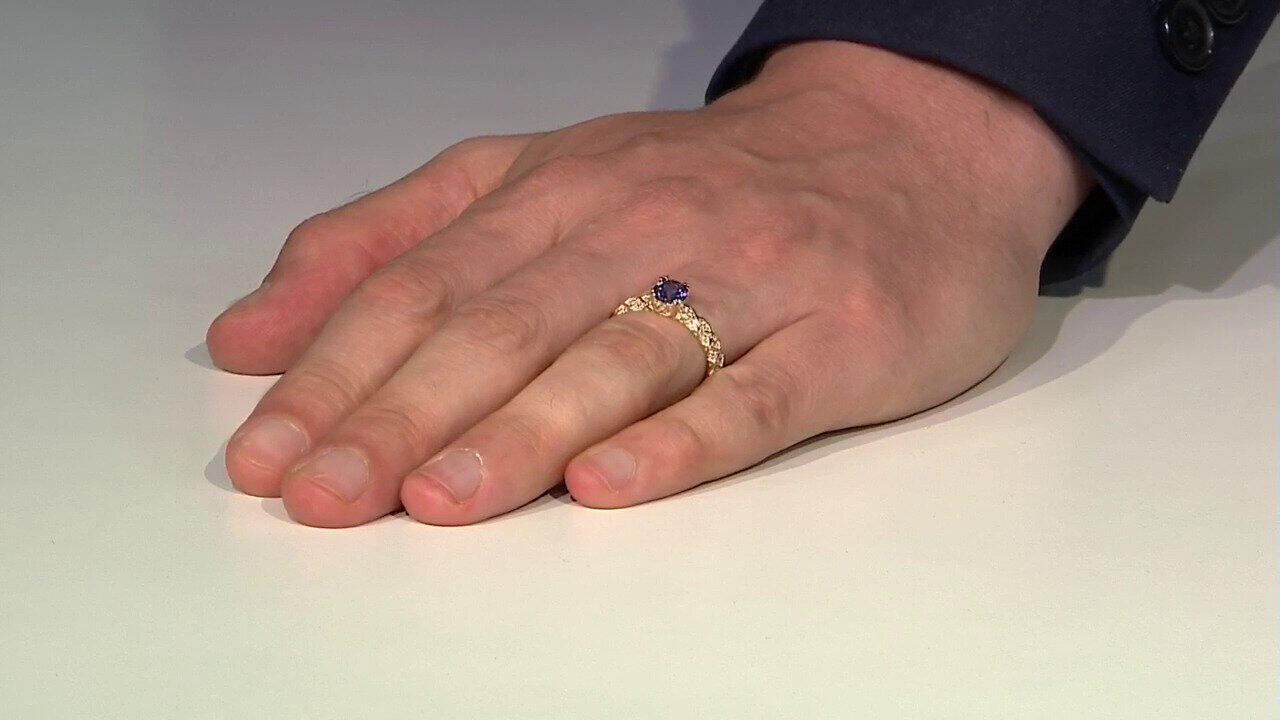 Video Gouden ring met een tanzaniet (de Melo)