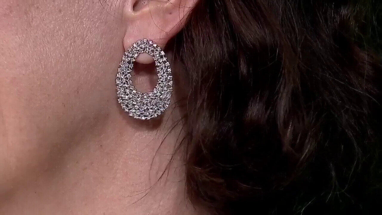 Video Gouden oorbellen met SI1 (H) Diamanten (Nara Jewelry)