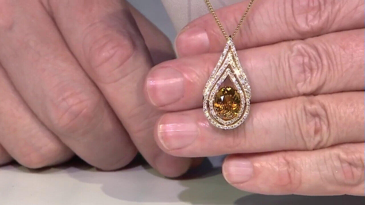 Video Gouden hanger met een Gele Zirkoon (de Melo)