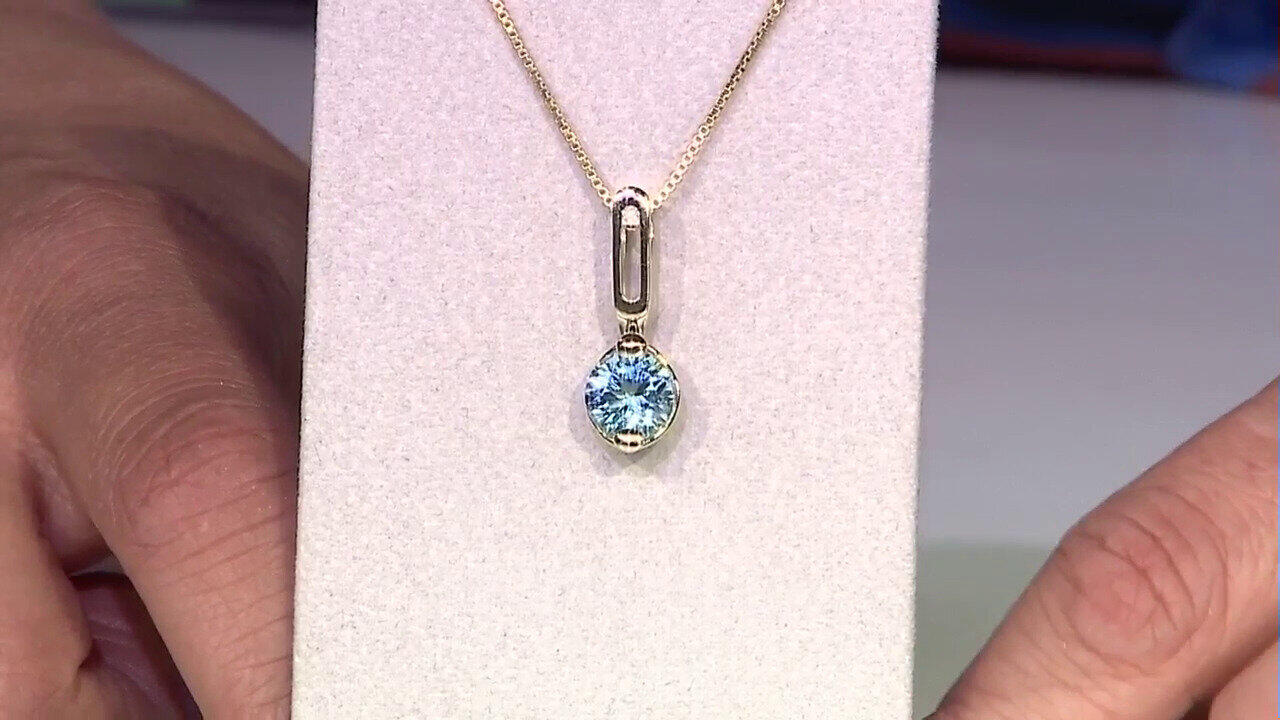 Video Pendentif en or et Topaze bleu ciel (dagen)