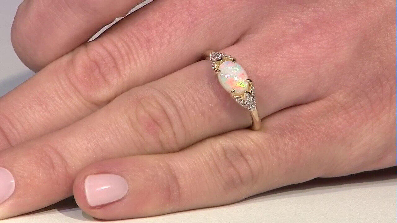 Video Gouden ring met een Coober Pedy opaal