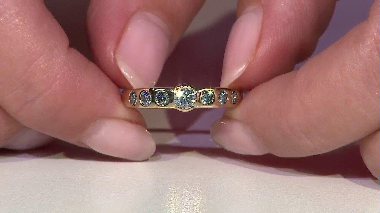 Video Anillo en oro con Diamante azul cielo I2