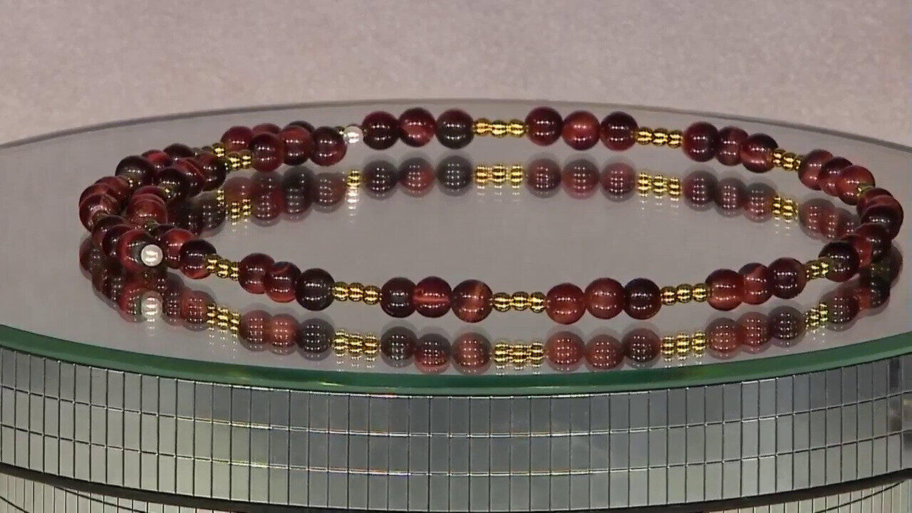 Video Collana rigida in acciaio con Occhio di Tigre Rosso (Riya)