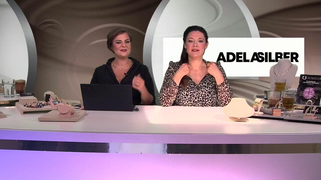 Video Zilveren halsketting met een witte topaas (Adela Silber)