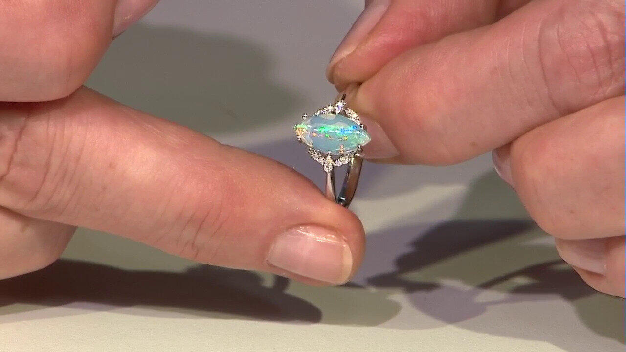 Video Gouden ring met een AAA Welo-opaal