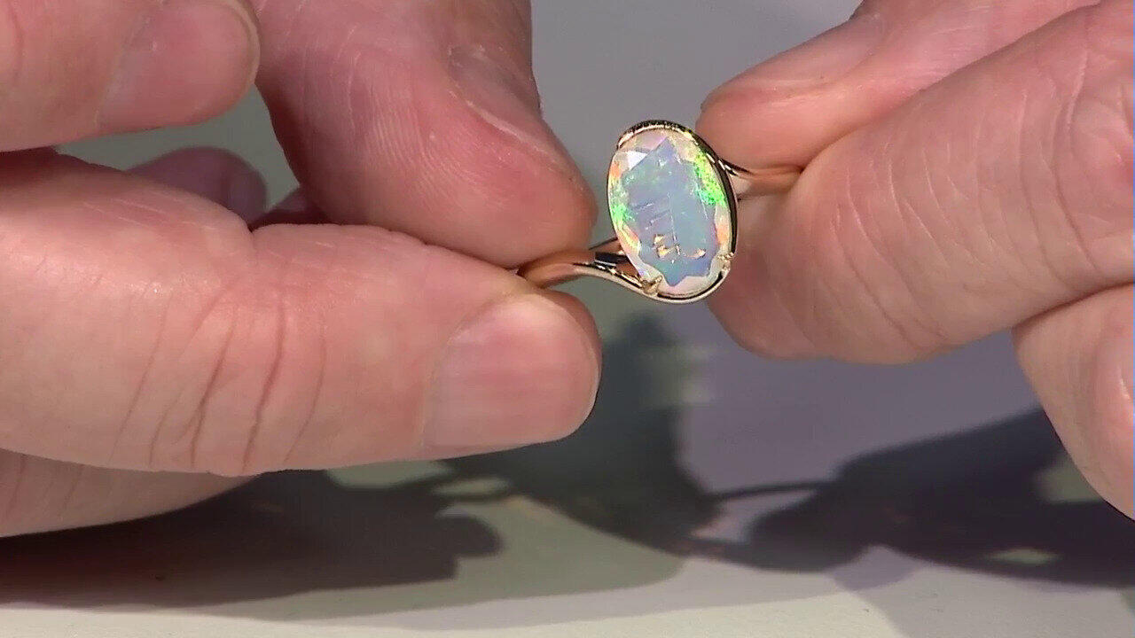 Video Gouden ring met een AAA Welo-opaal (de Melo)