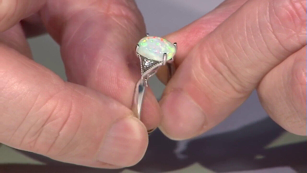 Video Gouden ring met een AAA Welo-opaal